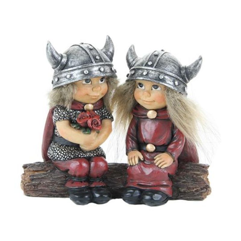 Viking children on tree trunk